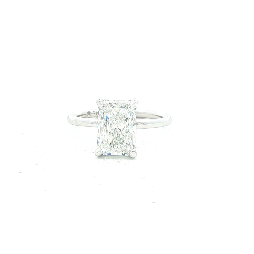 14K White Gold .09ct Radiant Diamond Solitaire Ring